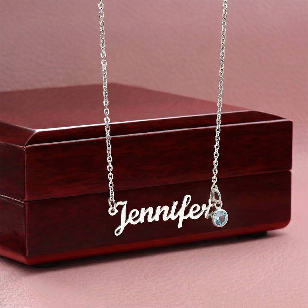 Personalized name necklace with birthstone charm in its gift box